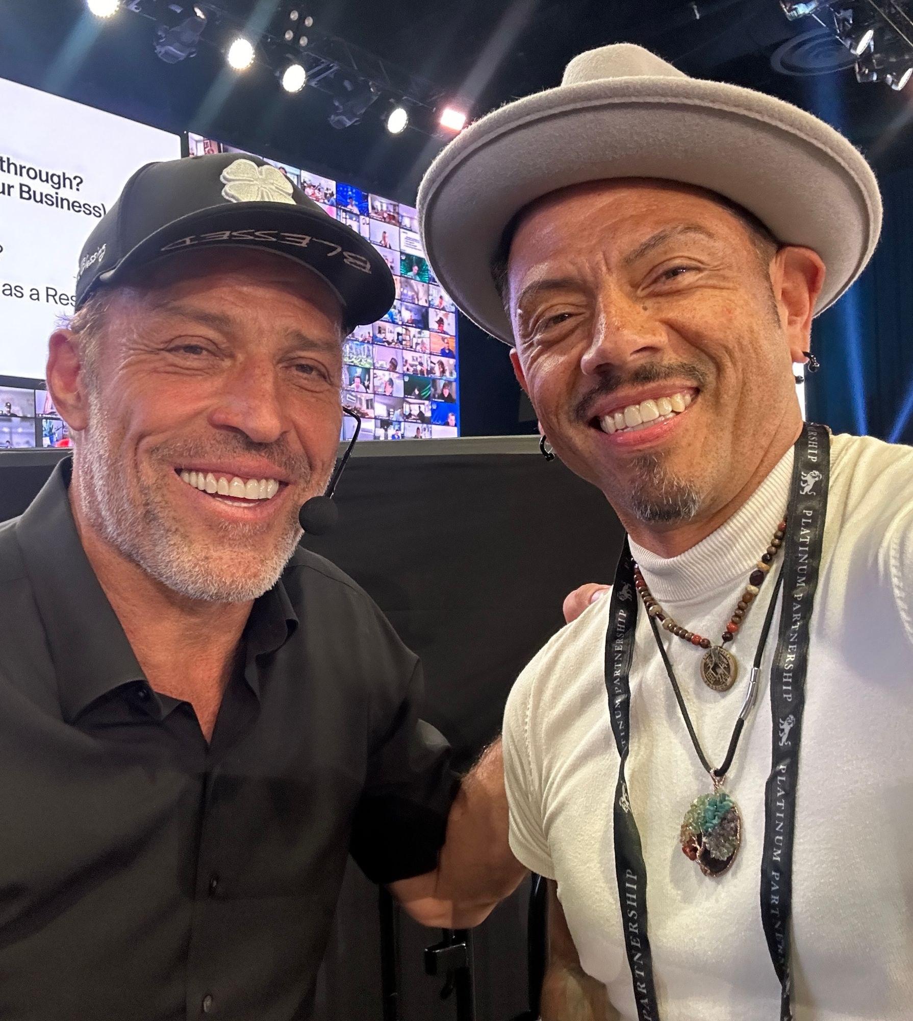 J.J. Villar with Tony Robbins backstage at a live event